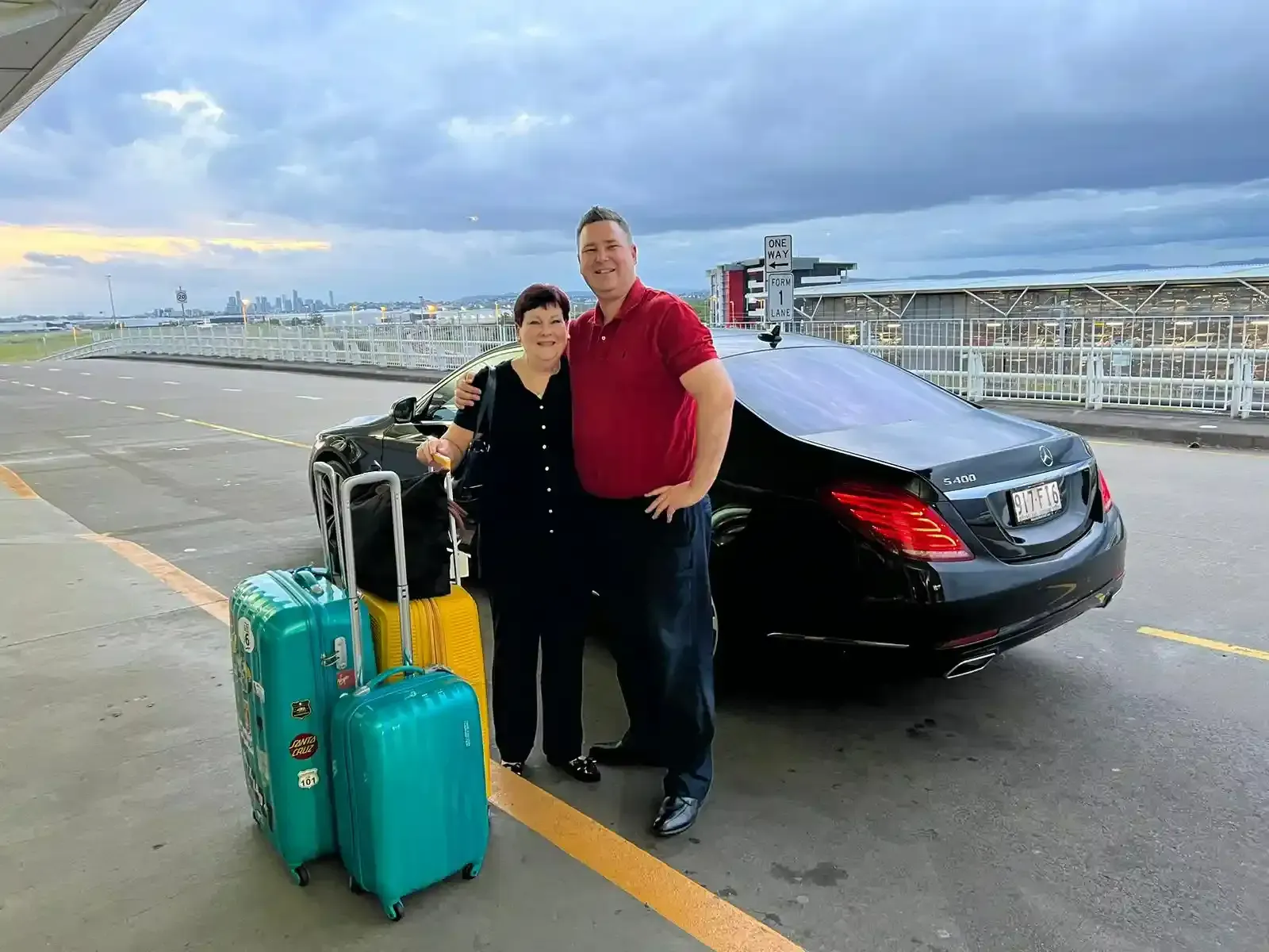 couple in chauffeur-driven car Brisbane